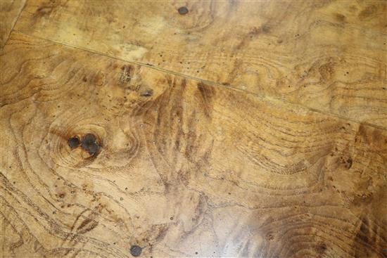 A 19th century burr elm console table with brass mounts W.113cm.